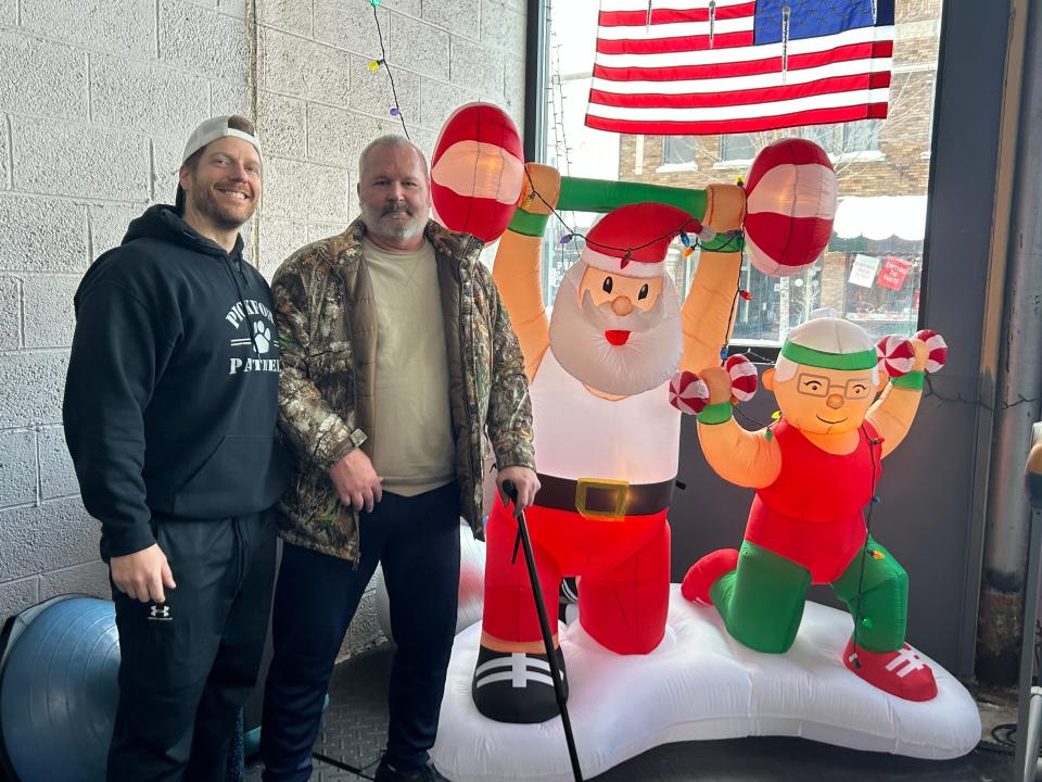 Phillip Woolcocks, (left) a personal trainer and owner of Up North Nutrition & Gym 906 in Sault Ste. Marie, said the "holidays and the first of the year are busy because everyone is making up a wish list for the new year." Standing next to Woolcocks is his client Mike Mesnard.