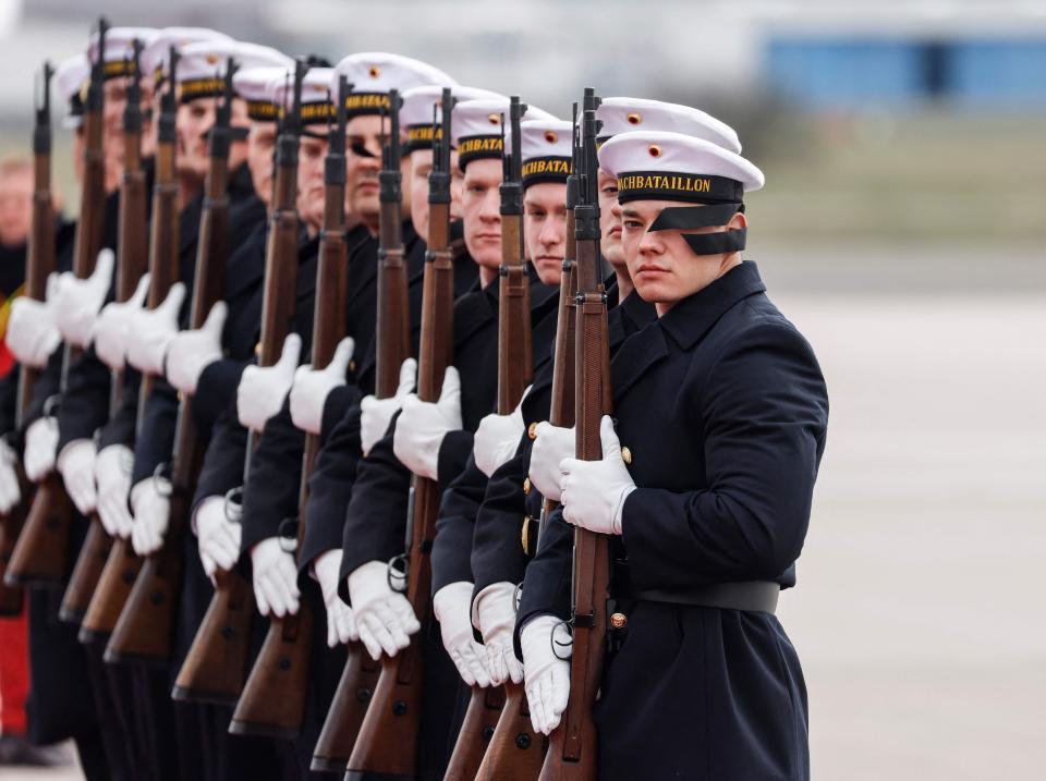 Members of a German honor guard carried out a 21 gun salute for King Charles III and Queen Consort Camilla.