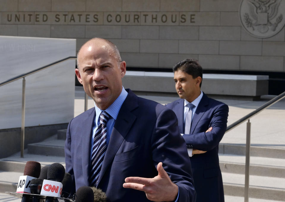 FILE - In this July 27, 2018 file photo Michael Avenatti, the attorney for porn actress Stormy Daniels replies to questions by reporters during a news conference in front of the U.S. Federal Courthouse in Los Angeles. A federal judge will consider Monday, Sept. 24, 2018, whether to toss out a lawsuit brought by Daniels against President Donald Trump and his former lawyer, Michael Cohen, weeks after Trump conceded a non-disclosure deal she signed just before the 2016 presidential election is invalid. (AP Photo/Richard Vogel,File)