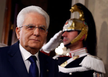 FILE PHOTO: Italian President Sergio Mattarella leaves after speaking to the media during the second day of consultations at the Quirinal Palace in Rome, Italy, April 5, 2018. REUTERS/Alessandro Bianchi/File Photo