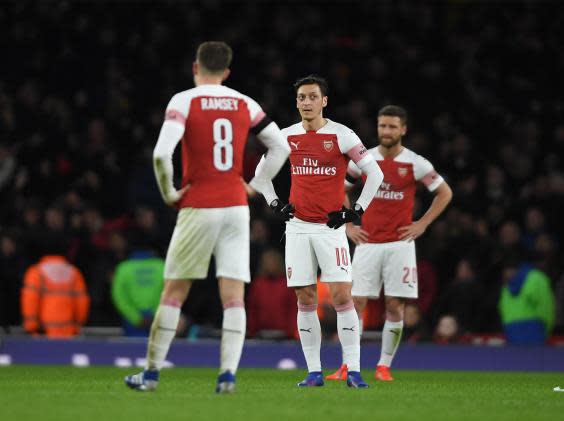 Arsenal have been reduced to this... hands on hips, a shrug of a football club (Getty Images)