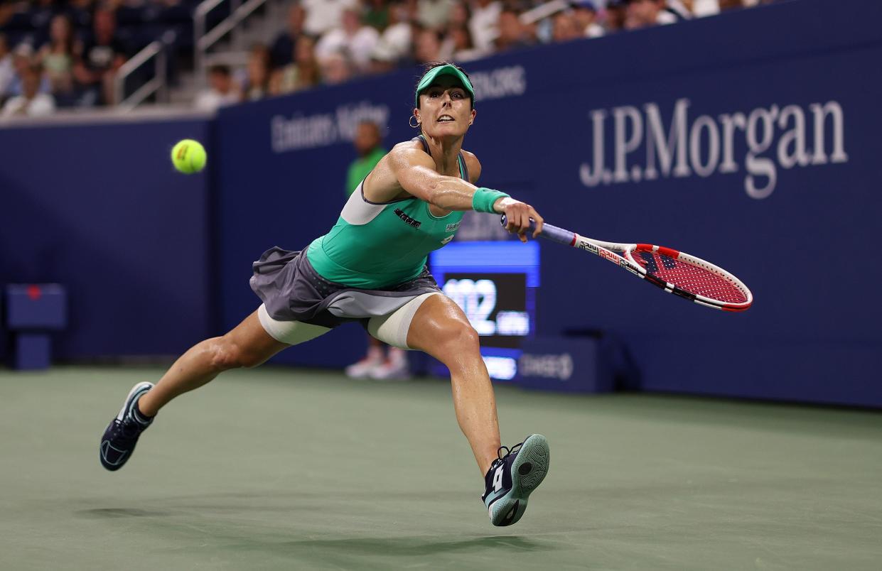 Alize Cornet of France in action against Emma Raducanu of Great Britain in their Women's Singles First Round match on Day Two of the 2022 U.S. Open at USTA Billie Jean King National Tennis Center on Aug. 30, 2022, in Flushing, Queens.
