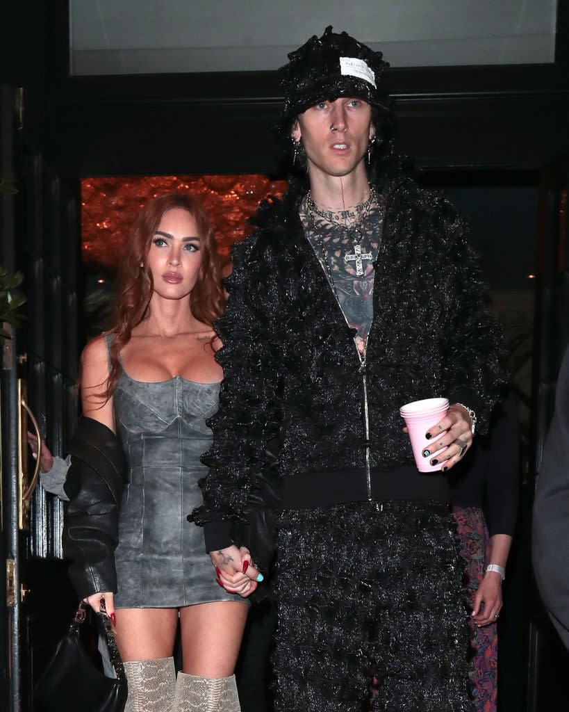 Megan Fox and Machine Gun Kelly are seen leaving the hotel heading to Marc Jacques Burton x Machine Gun Kelly - party at Bacchanalia on May 31, 2023 in London, England.