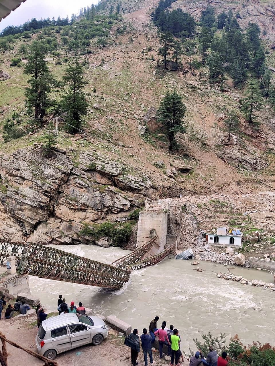 <div class="paragraphs"><p>A bridge collapsed after a landslide at Batseri of Sangla valley in Kinnaur district, Sunday, 25 July 2021. Nine people died in the landslide.</p></div>