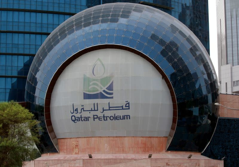 FILE PHOTO: The logo of Qatar Petroleum is seen at its headquartes in Doha