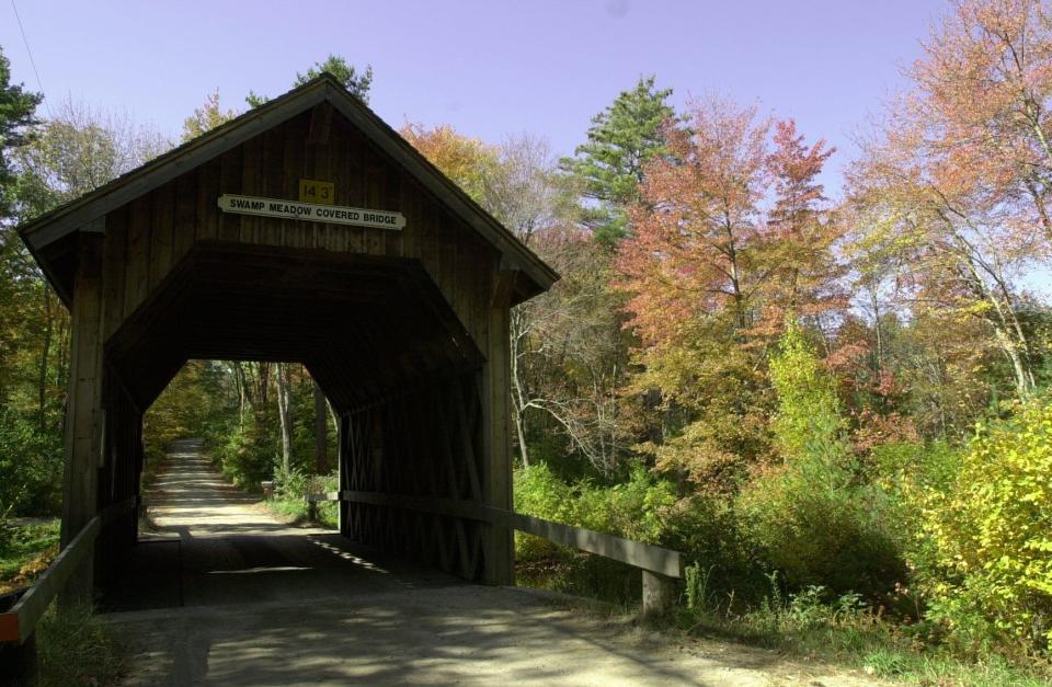 The Swamp Meadow covered bridge in Foster is down a dirt road which is the continuation of Central Pike after the intersection with Foster Center Road or Route 94, south of Route 6.