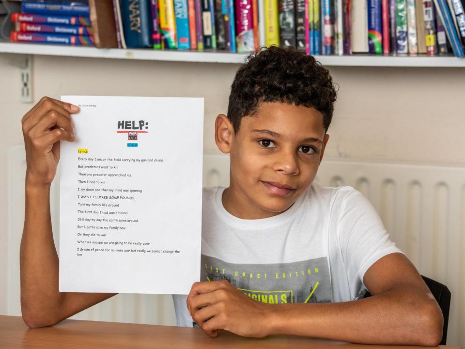 Twelve-year-old Dylan, who attends the Frances Barber Pupil Referral Unit in Wandsworth, south London, shows off his lyrics: Alex Lentati