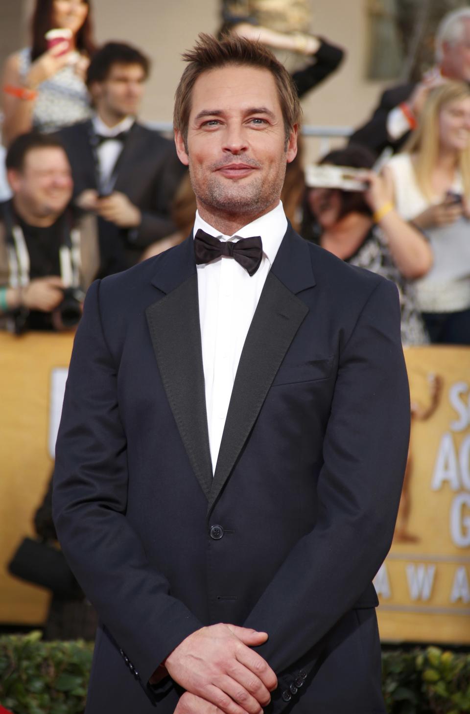 Actor Josh Holloway arrives at the 20th annual Screen Actors Guild Awards in Los Angeles, California January 18, 2014. REUTERS/Lucy Nicholson (UNITED STATES Tags: ENTERTAINMENT)(SAGAWARDS-ARRIVALS)