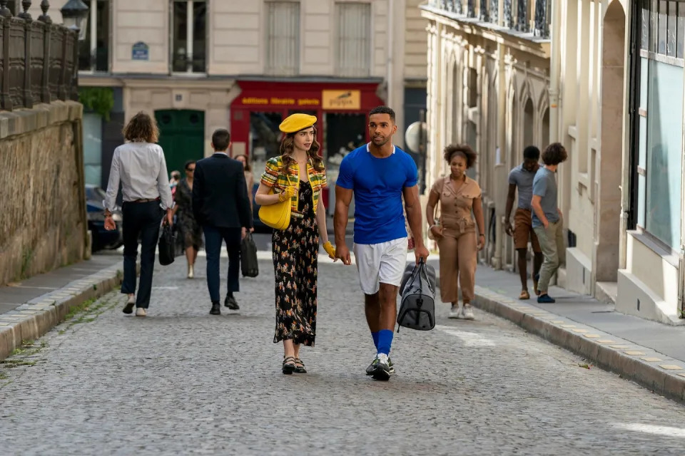 emily in paris l to r lily collins as emily, lucien laviscount as alfie in episode 209 of emily in paris