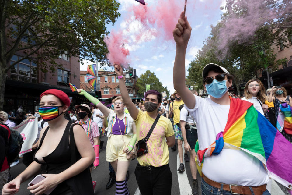 Protesters march in support of LGBTQI rights on Oxford Street in Sydney.