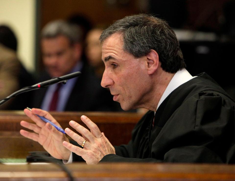 This image shows former New York Supreme Court Justice Michael Obus on the bench in Manhattan in 2011.