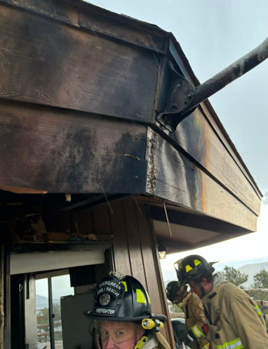 Fire crews were on the scene of a Evergreen house fire on Thursday afternoon that may have been caused by lightning, according to fire officials.