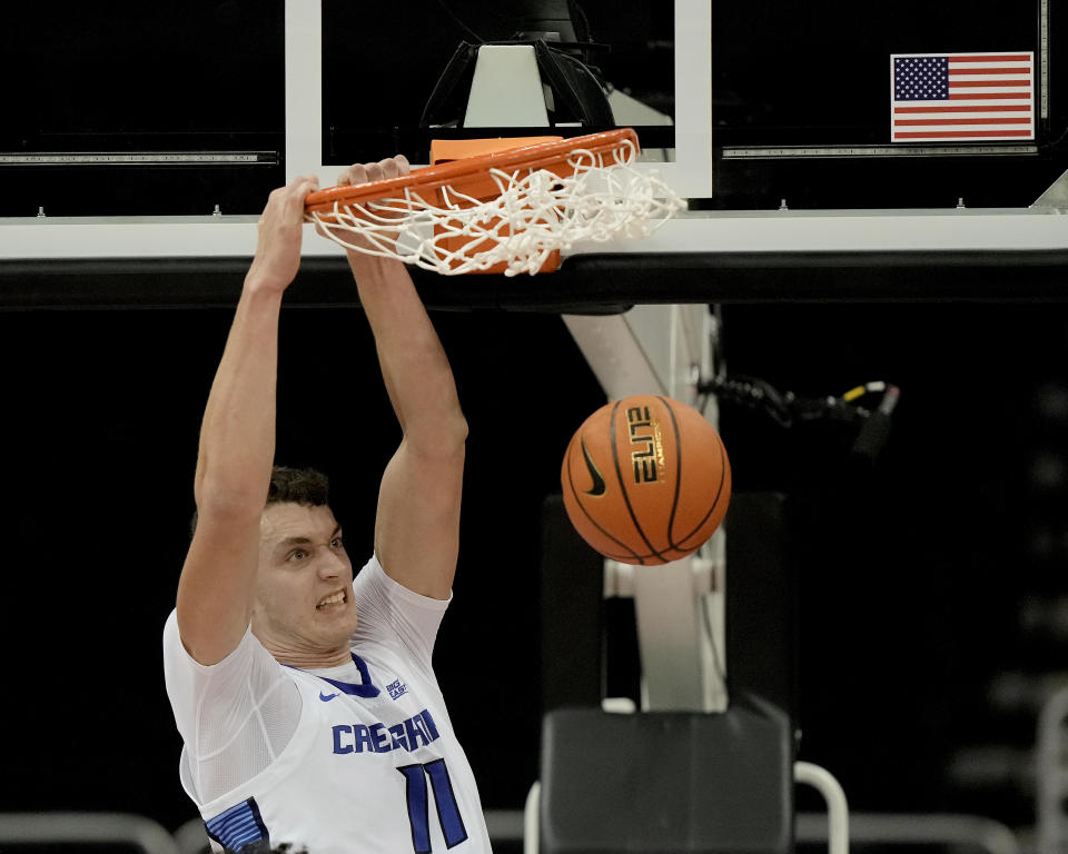 Creighton center Ryan Kalkbrenner dunks the ball during the second half of an NCAA college basketball game against Colorado State Thursday, Nov. 23, 2023, in Kansas City, Mo. Colorado State won 69-48. (AP Photo/Charlie Riedel)