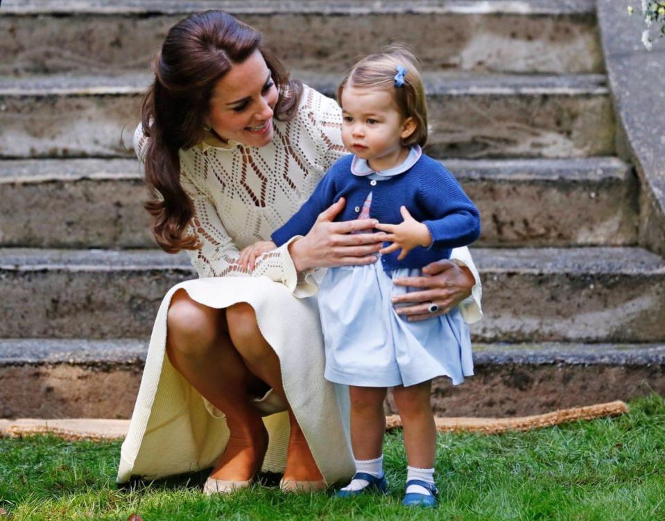 Catherine, Duchess of Cambridge, speaks to Princess Charlotte as they arrive at a children’s party at Government House in Victoria, Thursday, Sept.29, 2016. THE CANADIAN PRESS/POOL-Chris Wattie