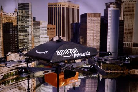 FILE PHOTO: An Amazon Prime Air Flying Drone is displayed during the 'Drones: Is the Sky the Limit?' exhibition at the Intrepid Sea, Air & Space Museum in New York City, U.S., May 9, 2017. REUTERS/Brendan McDermid/File Photo