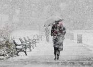 A woman in Scotland walks through a blizzard as the northern part of the UK remains in the grip of a cold snap. Met Office forecaster Dan Williams told Yahoo! News that the icy blast has been caused by a stream of cold Arctic from the north west which has swept across the northern half of the UK.