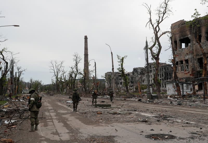 Russian service members demine the territory of Azovstal steel plant in Mariupol