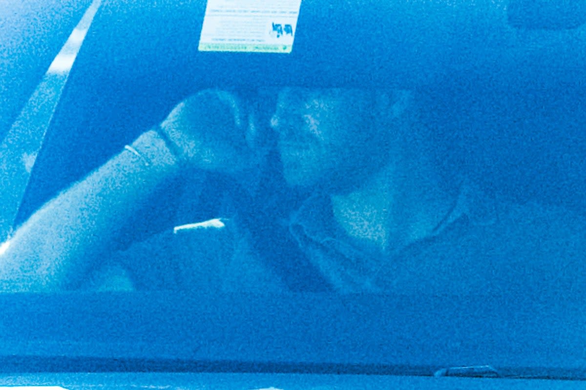 Prince Harry in the passenger seat of a car that picked him and his family up  in Santa Monica  (Rex Features)