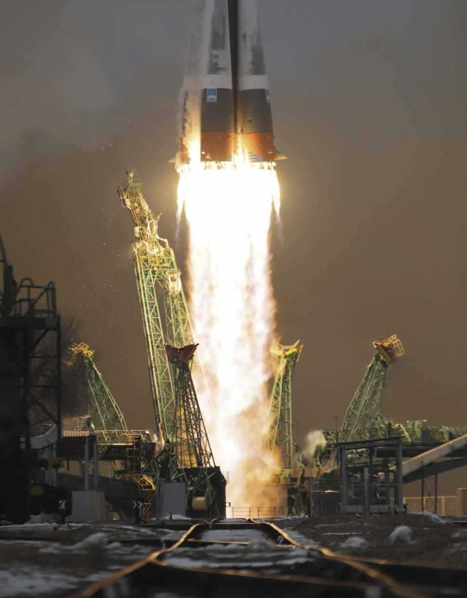 The wake of the Soyuz-2.1a rocket booster with Soyuz MS-20 space ship carrying Russian Roscosmos cosmonaut Alexander Misurkin, and spaceflight participants Japanese fashion tycoon Yusaku Maezawa, and Japanese producer Yozo Hirano is seen after the launch at the Russian leased Baikonur cosmodrome, Kazakhstan, Wednesday, Dec. 8, 2021. A Japanese billionaire and his producer rocketed to space Wednesday as the first self-paying space tourists in more than a decade. (Ivan Timoshenko/Roscosmos Space Agency via AP)