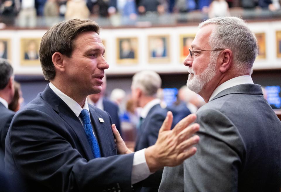 Gov. Ron DeSantis congratulates Sen. Ben Albritton on his new role as Senate president-designate after a ceremony on Tuesday, Oct. 17, 2023.