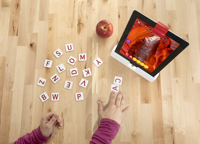 Osmo adapter for iPad with letter game