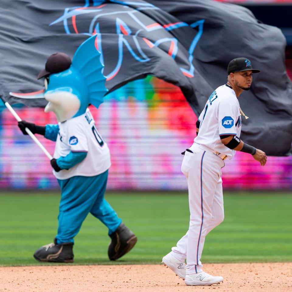 Miami Marlins second baseman Luis Arraez (3) celebrates after defeating the Minnesota Twins 5 to 2 during an MLB game at loanDepot park on Wednesday, April 5, 2023, in Miami, Fla.