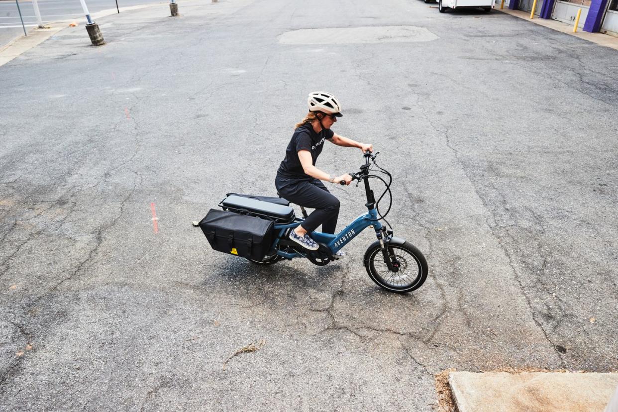 riding an ebike in an empty parking lot