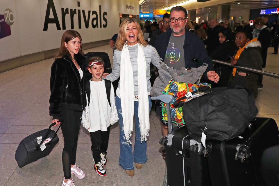 Kate Garraway with her husband Derek Draper and their two children Darcey and Bill in 2019 (PA)