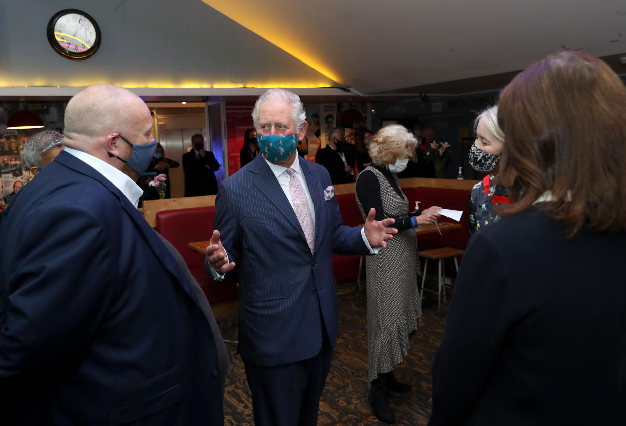 LONDON, ENGLAND - DECEMBER 03: Prince Charles, Prince of Wales wears a face mask as he speaks to senior representatives during his visit to Soho Theatre with Camilla, Duchess of Cornwall to celebrate London's night economy on December 03, 2020 in London, England. (Photo by Chris Jackson - WPA Pool/Getty Images)