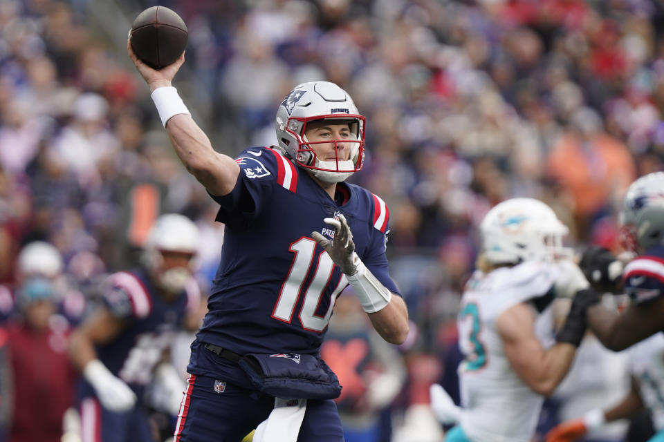 New England Patriots quarterback Mac Jones (10) throws a pass during the first half of an NFL football game against the Miami Dolphins, Sunday, Jan. 1, 2023, in Foxborough, Mass. (AP Photo/Steven Senne)