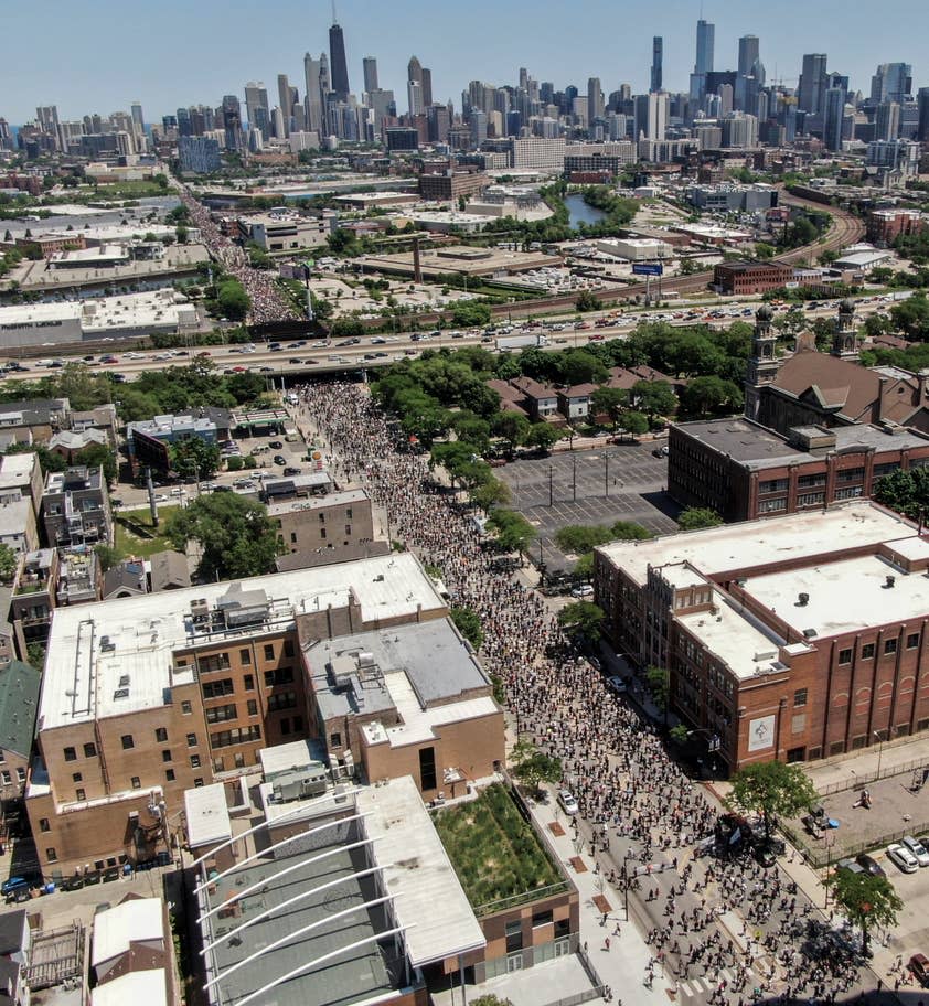 People marching in Chicago on Saturday (EPA/Tannen Maury)