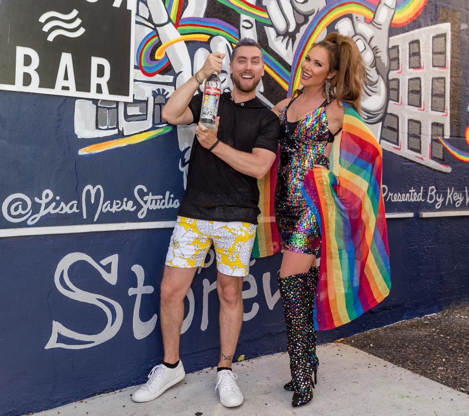 The 'NSYNC singer and <em>Real Housewives of Dallas</em> star participated in the 6th Annual Stoli Key West Cocktail Classic, where they were photographed in front of a mural created by artist, Lisa Marie Thalhammer, in celebration of the launch of the Stoli® "Spirit of Stonewall" limited edition bottle.