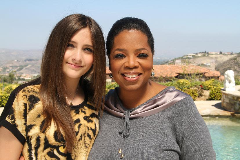 FILE - This undated image originally released by Harpo, Inc. shows host Oprah Winfrey posing with Paris Jackson, daughter of the late pop icon Michael Jackson in Los Angeles. Winfrey interviewed Jackson for an "Oprah's Next Chapter," special which aired on June 10 on OWN. (AP Photo/Harpo Inc., George Burns)