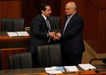 Lebanon's Prime Minister Saad al-Hariri talks with Lebanon's Finance Minister Ali Hassan Khalil as they attend general parliament discussion in downtown Beirut, Lebanon October 18, 2017. REUTERS/Mohamed Azakir