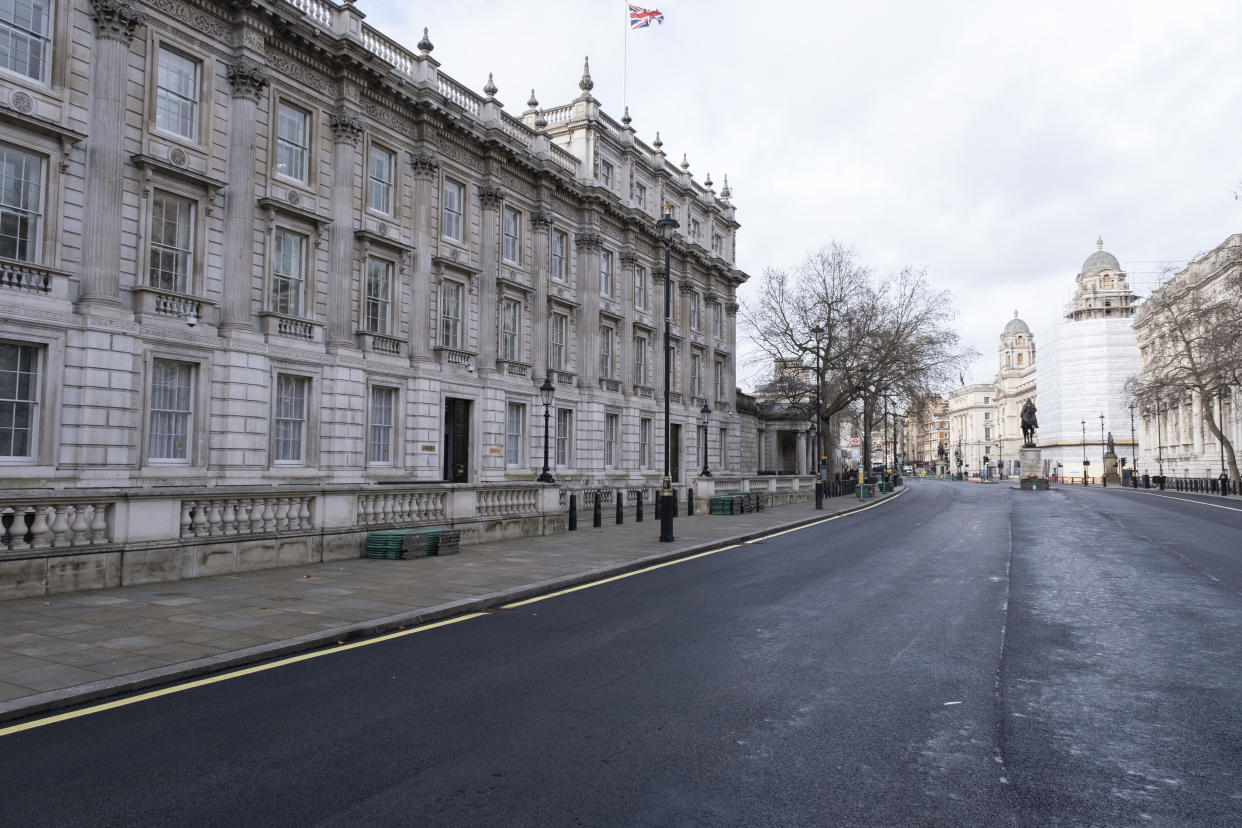 With very few people out and about the scene looking along Whitehall in Westminster outside the Cabinet Office is one of empty desolation as the national coronavirus lockdown three continues on 28th January 2021 in London, United Kingdom. Following the surge in cases over the Winter including a new UK variant of Covid-19, this nationwide lockdown advises all citizens to follow the message to stay at home, protect the NHS and save lives. (photo by Mike Kemp/In Pictures via Getty Images)