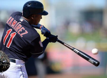 FILE PHOTO: Mar 13, 2019; Goodyear, AZ, USA; Cleveland Indians second baseman Jose Ramirez (11) hits a double against the Milwaukee Brewers during the fifth inning at Goodyear Ballpark. Mandatory Credit: Joe Camporeale-USA TODAY Sports