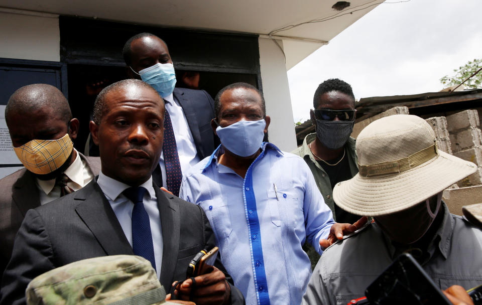Yves Jean-Bart, president of the Haitian Football Federation, leaves the Crois-Des-Bouquets prosecutor’s office after his hearing, accused of sexually abusing young footballers at the country’s national training centre, in Crois-Des-Bouquets, Haiti, on May 14, 2020.<span class="copyright">Jeanty Junior Augustin—Reuters</span>