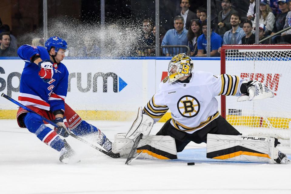 Oct 5, 2023; New York, New York, USA; Boston Bruins goaltender Jeremy Swayman (1) makes a save against New York Rangers left wing Will Cuylle (50) during the third at Madison Square Garden. Mandatory Credit: Dennis Schneidler-USA TODAY Sports ORG XMIT: IMAGN-713856 ORIG FILE ID: 20231005_ams_si5_0133.JPG