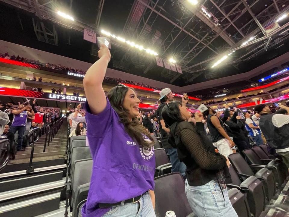 Sacramento Kings fan Kira Moran rings her cowbell at the Game 3 watch at Golden 1 Center on Thursday.