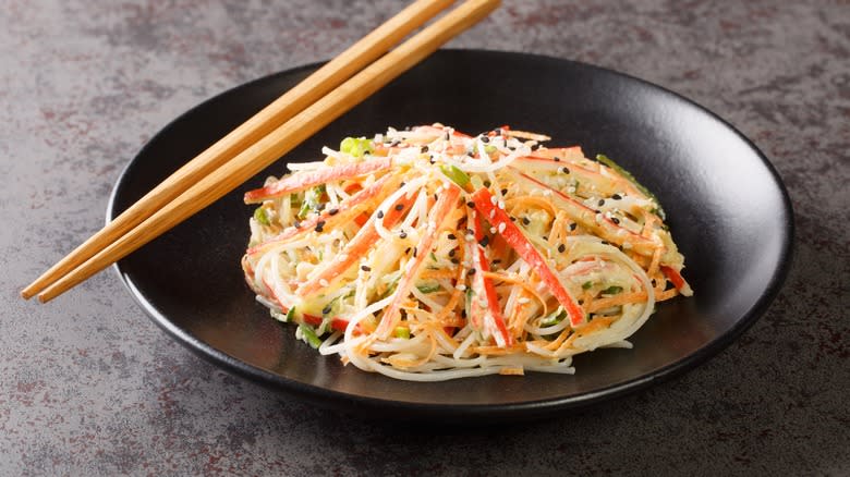 kani salad with chopsticks