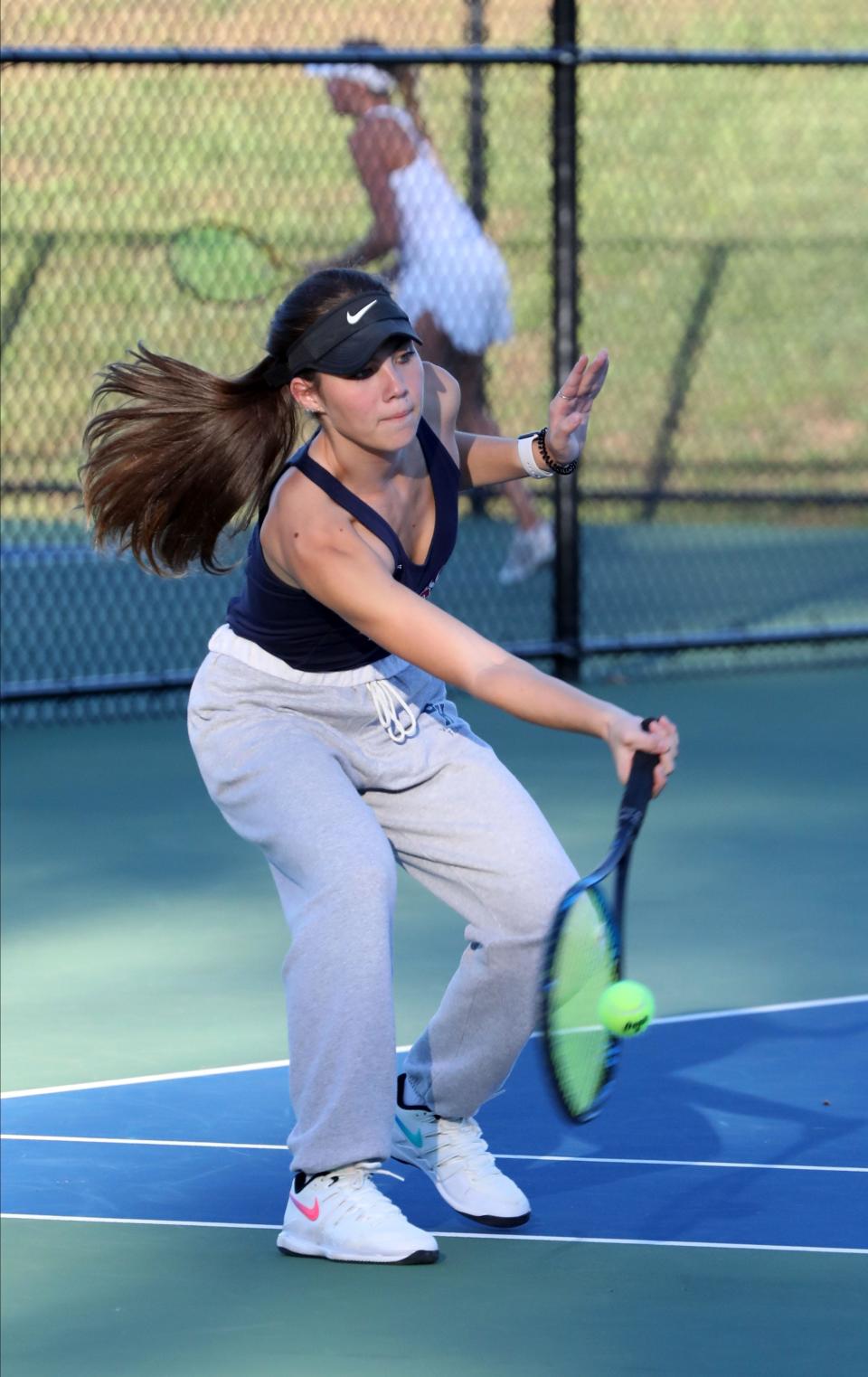 Byram Hills' Jenna Kleynerman returns a shot to Rye Neck's Dylan White during the Section One girls tennis team finals were held at Harrison High School, Oct. 18, 2022. Byram Hills beat Rye Neck in the Division Two Championship.