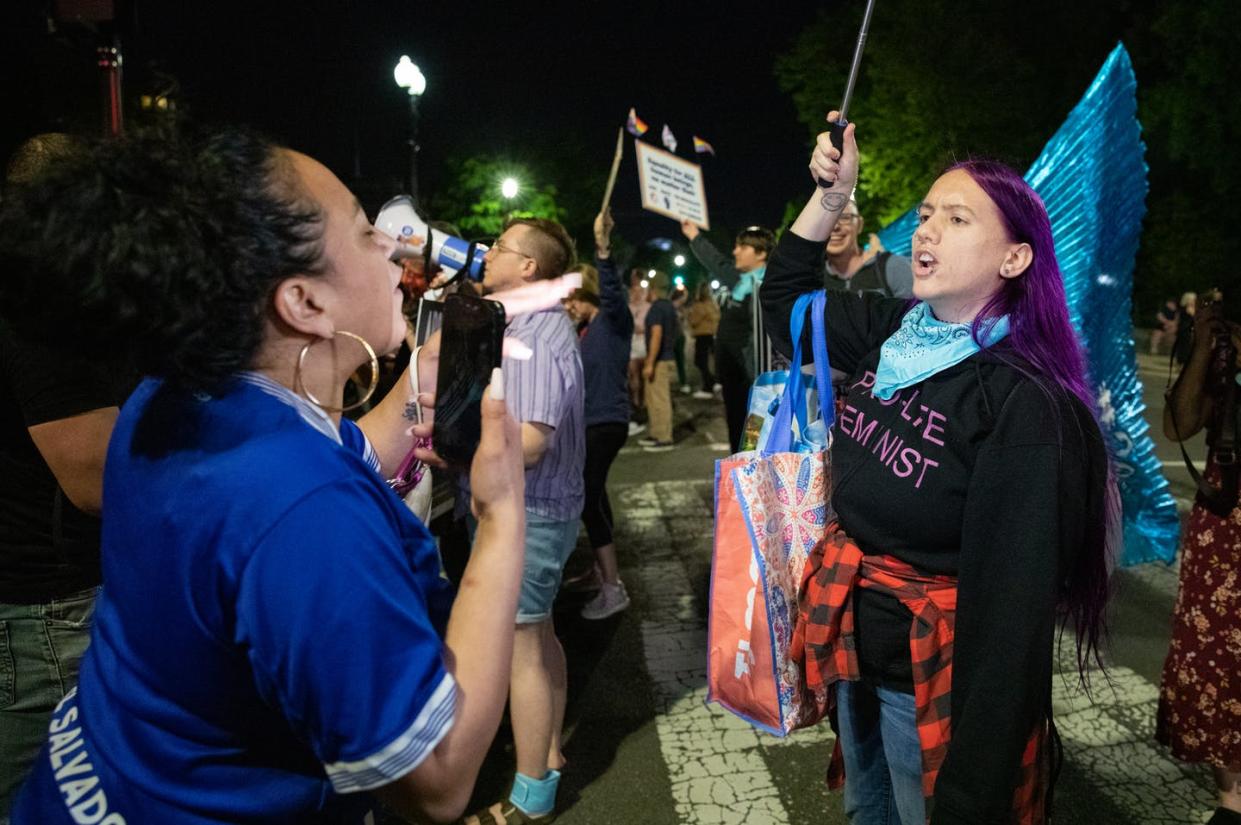 <span class="caption">Abortion rights battles look set to go from the Supreme Court to statehouses.</span> <span class="attribution"><a class="link " href="https://www.gettyimages.com/detail/news-photo/pro-choice-protester-left-and-an-anti-abortion-protesters-news-photo/1240412950?adppopup=true" rel="nofollow noopener" target="_blank" data-ylk="slk:Amanda Andrade-Rhoades/For The Washington Post via Getty Images;elm:context_link;itc:0;sec:content-canvas">Amanda Andrade-Rhoades/For The Washington Post via Getty Images</a></span>