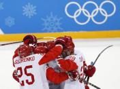 Ice Hockey - Pyeongchang 2018 Winter Olympics - Men Semifinal Match - Czech Republic v Olympic athletes from Russia - Gangneung Hockey Centre, Gangneung, South Korea - February 23, 2018 - Olympic athletes from Russia's players celebrate after Ilya Kovalchuk scores a goal. REUTERS/Kim Kyung-Hoon