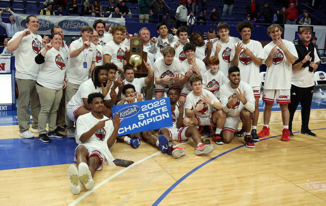 Clark County’s team posed with the state championship trophy after winning last season’s Sweet Sixteen in Rupp Arena. The Cardinals return several stars from that team and are ranked No. 1 to start the 2022-23 campaign.