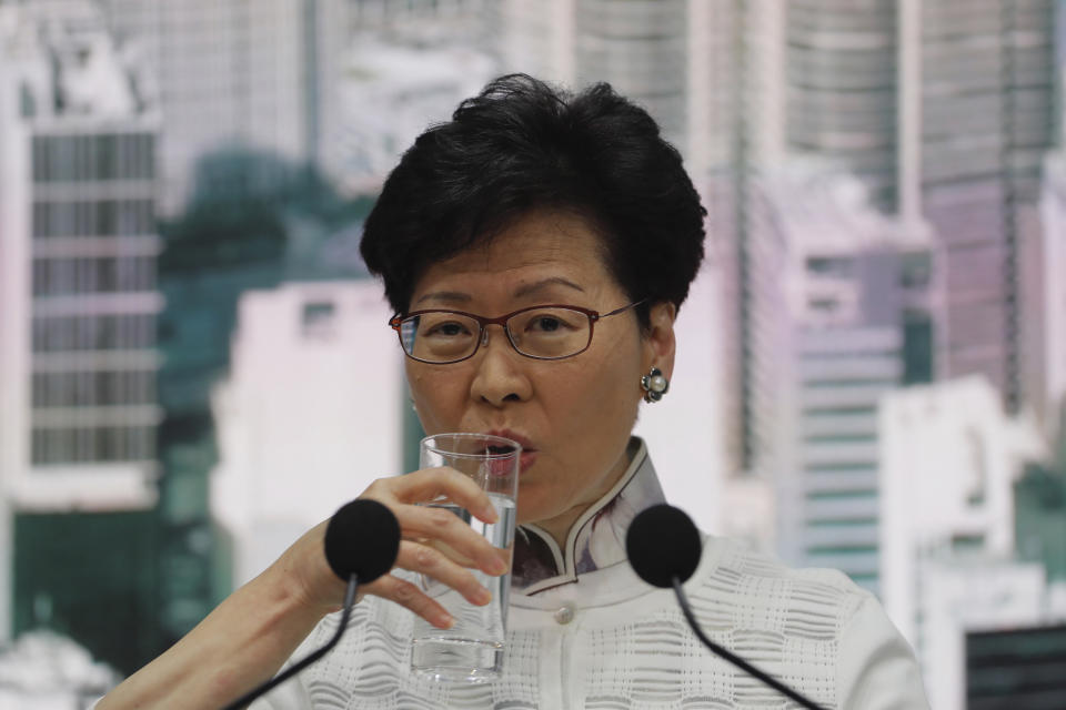 Hong Kong's Chief Executive Carrie Lam attends a press conference on Saturday, June 15, 2019, in Hong Kong. Lam said she will suspend a proposed extradition bill indefinitely in response to widespread public unhappiness over the measure, which would enable authorities to send some suspects to stand trial in mainland courts. (AP Photo/Kin Cheung)