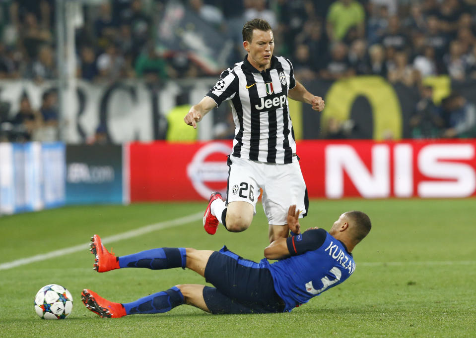 Football - Juventus v AS Monaco - UEFA Champions League Quarter Final First Leg - Juventus Stadium, Turin - Italy - 14/4/15 Juventus' Stephan Lichtsteiner in action with Monaco's Layvin Kurzawa Reuters / Stefano Rellandini