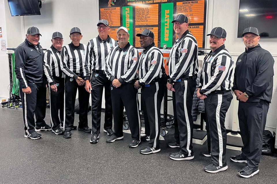 Members of the Gulf Coast Football Officials Association who worked the Class 2 Suburban state football championship game between Bradford High and Cocoa High on Friday night at Ken Riley Field at Bragg Memorial Stadium on the campus of Florida A&M University in Tallahassee.