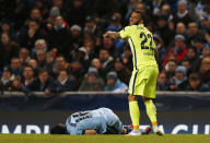 Football - Manchester City v FC Barcelona - UEFA Champions League Second Round First Leg - Etihad Stadium, Manchester, England - 24/2/15 Manchester City's Sergio Aguero and Barcelona's Dani Alves Reuters / Phil Noble Livepic EDITORIAL USE ONLY.