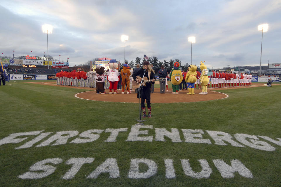 This photo provided by the Reading Fightin Phils shows Taylor Swift singing the anthem before a Reading Fightin Phils minor league baseball game at First Energy Stadium in Reading, Pa., April 5, 2007. Swift got her singing career started by performing the national anthem at sporting events as a young child and teenager. (Reading Fightin Phils via AP)