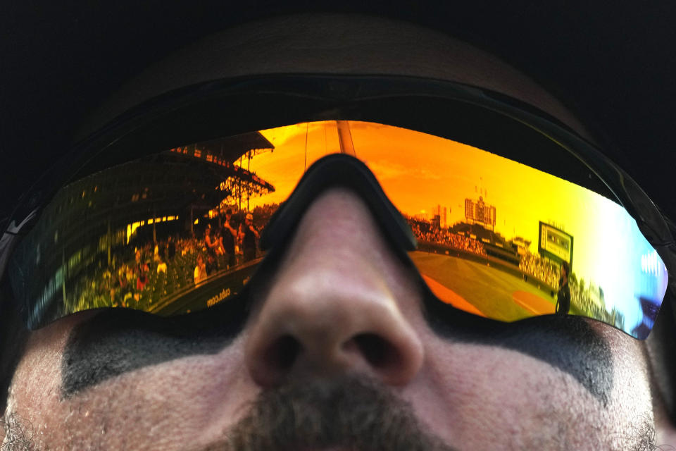 Colorado Rockies' Charlie Blackmon looks to fans before a baseball game against the Chicago Cubs in Chicago, Friday, Sept. 22, 2023. (AP Photo/Nam Y. Huh)